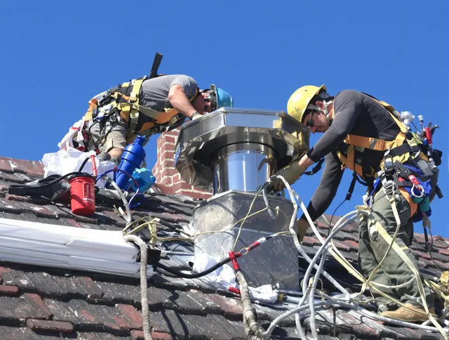 Protective chimney cap installed by Cuyahoga Falls Chimney Sweep in Cuyahoga Falls, OH